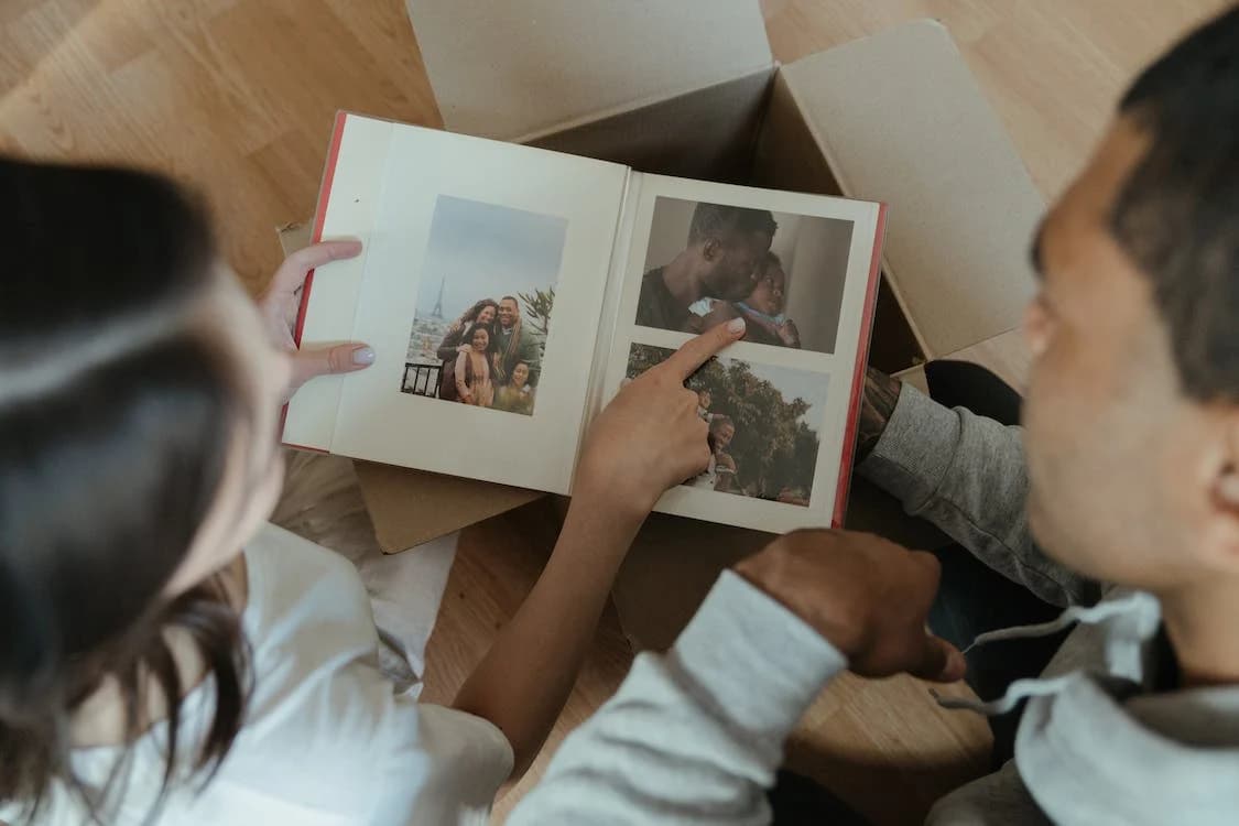 A couple looking at the photo album